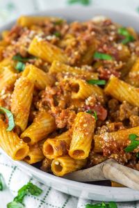 A mash-up of three famous pasta dishes, amatriciana, cacio e pepe and carbonara, this pasta alla zozzona is an eruption of flavor. #pastaallazozzona #pasta #rigatoni | chiselandfork.com