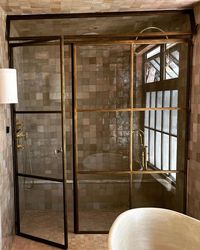 Brass steam shower with operational transom. Hand patinaed and cast hardware by us. I love how warn this patina looks. For the best… | Instagram