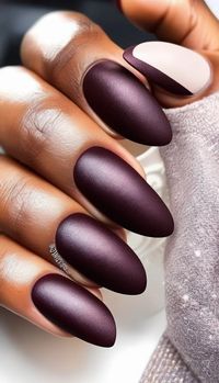 Matte burgundy nails bring a luxurious, warm touch to your fall nail game. #BurgundyNails #FallMatteNails