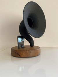 "Father's Day and Etsy Welcome Sale for 20% worldwide until the end of the May! FREE SHIPPING to USA, Europe and Canada for a Limited Time! Let us introduce you our 100% Handmade Unique Gramophone Speakers. Unique Home Decor Gift - Lovely Housewarming, Birthday, Christmas and Mothers Day Gift Our Gramophone speakers are invented to let your music, and you be free. Putting your smartphone on the dock will give the Gramophone speaker to amplify your favourite songs up to \"three times\" without th