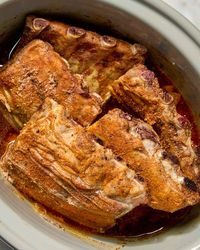 overhead shot of ribs in the slow cooker