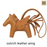 These horse bag charms are hand-sewed with high quality lambskin leather (body and string), with crocodile leather wing or ostrich leather wing. 50 colors. 
#awulook #awulookstrap #bagcharm #minihorse #miniflyinghorse #hermes