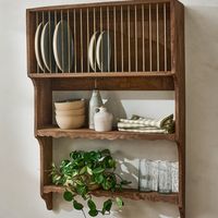 The Quinn Wooden Cabinet blends classic elegance with innovative functionality, providing a creative storage solution for your kitchen or home. Fitted with a thoughtfully designed plate rack and double shelves for smaller dishes, this beautiful piece is a testament to exceptional craftsmanship.