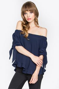 Show up at your favorite Cafe in the Freya Navy Off-The-Shoulder Top!  If only you saw what they can see in this cute top, you’ll wear it everywhere!  Lightweight poly fabric starts with an elastic off-the-shoulder navy top that attaches to mid length sleeves that tie at the ends and falls into a ruffled hem.