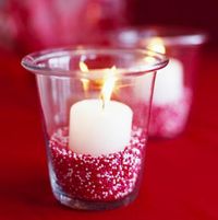 Festive candle: Add Valentine's candy nonpareils or small beads in the bottom of a votive for a festive candle display.