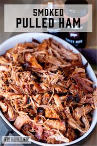 This Smoked Pulled Ham is ham is slow smoked and glazed with a tasty apricot jam/BBQ sauce combo for the most amazing bit of pork deliciousness you'll ever have.