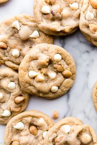 These are my super soft super chunk white chocolate macadamia nut cookies. These buttery and chewy cookies are loaded with white chocolate chips and macadamia nuts! Recipe on sallysbakingaddiction.com