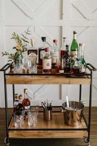 Want a rustic charm for your bar cart? Our bar cart farmhouse style guide includes good bar cart tips and liquor trolly ideas for a cozy setup. Save this pin to add farmhouse warmth to your bar cart.