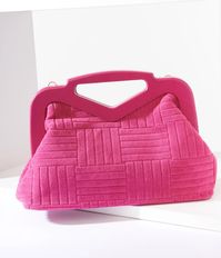 This bold handbag is crafted with a textured fuchsia cloth body featuring a magnetic top closure handle. Complete with an inside pocket and removable adjustable shoulder strap.