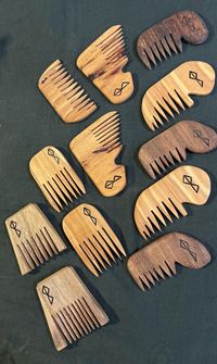 Pocket/beard combs, carved from local wood, in a style inspired by historical finds