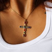 Multicolor Cross Necklace, Vintage Inspired Necklace, Cross Jewelry for Her, Multicolored Gemstone Necklace, Christmas Gift, Maximalist  ☽ 18K Gold Plated, Multicolored CZ Charm (34x17.2x4.4mm) ☽ This is a gold plated charm meaning that it requires extra care to keep its shine and color intact. Please follow these tips to make the charm last longer in its original condition: avoid wearing it to the beach, pool, shower, bathtub, hot tub; avoid it touching any lotions, creams, or sweat; take it off before going to bed. ☽ Gold stainless steel chain closed with a lobster clasp ✧･ﾟ: *✧･ﾟ･ﾟ: *✧･ﾟ･ﾟ: *✧･ﾟ･ﾟ ☽ This beautiful multicolored cross is the perfect maximalist accessory to layer with other necklaces or to wear on its own as a statement piece! ☽ All pieces of jewelry are handmade with love