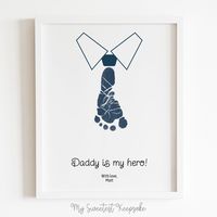 "Printable \"Daddy is my hero\" tie footprint keepsake for Dad. Edit using Adobe Reader DC, print at home and stamp your baby's foot, making dad's tie. This product is an Instant Download (Editable PDF) to make a memorable gift. SIZES - After cut: 5\" x 7\" and 8\" x 10\" - PDF sizes: 8.5\" x 11\" and A4 HOW DOES IT WORK? - Download the files - Open it on your computer using Adobe Reader DC (latest version) - Type your text in highlighted areas - Print at home in white cardstock - Cut out following the crop marks and - Stamp your baby's foot IMPORTANT - Download Adobe Reader DC for FREE at http://get.adobe.com/reader/. - Edit these files on your computer using the latest version of Adobe Reader, typing your text on blue highlighted boxes. There are photos on the listing showing the editabl