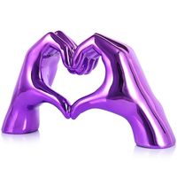 PRICES MAY VARY. Elegant Boho and Art Deco Design: This Purple Heart Hands Sculpture combines boho and art deco styles, perfectly blending modern and traditional elements, making it an ideal choice for purple room decor. Whether used as table decorations, purple shelf decor, or purple bookshelf decorations, it adds a unique artistic touch suitable for various home styles. Dimensions: 9.8 inches (L) * 5.5 inches (H) * 3.1 inches (W). Versatile Decoration: This sculpture is suitable for purple liv