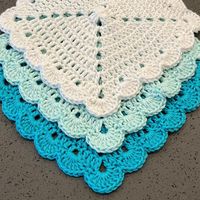 This set of three dish cloths includes 3 Cotton Dishcloths Made to Order These scalloped dish/wash cloths are my absolute favorite!  They are so versatile for use in the kitchen or bathroom.  ~ Item Description ~ Three pack of scalloped wash cloths/dish cloths in the turquoise, aqua and white. **Please note that color may vary slightly due to screen resolution/brightness. Handmade in my smoke free and pet friendly home! ~ Dimensions ~  Each dish cloth measures approximately 8.5 inches and is mad