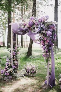 blush pink and purple floral with lavender fiber arch for outdoor wedding ideas