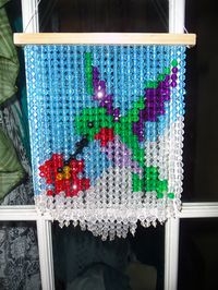 This is a sun-catcher I  made. They sparkle so pretty.