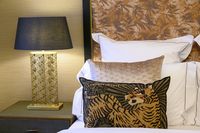 Animal print pillows are a great way to give a touch of the wild to your safari bedding ensemble.