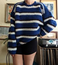 Handmade crochet sweater made out of acrylic yarn Can fit sizes S-XL, fit will just differ depending (ie. will be oversized on S, and standard fit on XL)  Model is size S  Can machine wash on delicates cycle in cold water, or handwash in same temp.