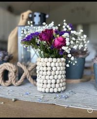 Check out how we turned Dollar tree beads into this adorbale vase!