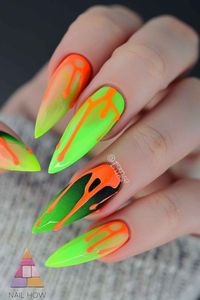 These neon green and orange dripping designs are perfect for making a statement. Ideal for any occasion, discover more neon nail art at nailhow.com.