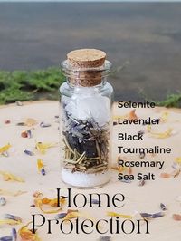 A blend of intentional herbs and crystals creates this home protection spell jar