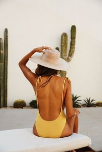 This yellow low back bathing suit would be amazing in a empowered boudoir photoshoot.