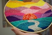 This is a beautiful custom made embroidery rainbow style sunset. The whole hoop is covered in embroidery which makes this piece so unique and would make a perfect feature piece of decor! Height: 8 Inches; Width: 8 Inches  $53.95 from the UK. Great gifts for aunt and can double as home decor as well. Beautiful handmade embroidery hoop piece. #homedecor #walldecorideas #mollthedesigner #etsygifts #giftideas #christmasgifts #giftsforaunt #giftsforher