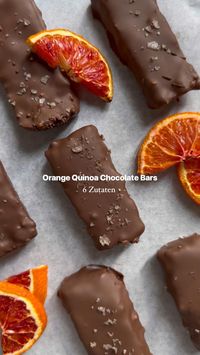 1hr · 10 servings     🍊 Orange Quinoa Bars. Eindeutig süchtig geworden. I do recommend.   Rezept:  • 15 Datteln   • 2 EL Mandelmus  • Einen Schuss Wasser - so das alles bissi bedeckt ist.   Mit einem Standmixer zu einem Brei verarbeiten.   120g Gemahlene Mandeln  • 60g Kokosraspeln  • Gepufftes Quinoa (nach Gefühl)  • 2 EL Backkakao (kann auch mit Proteinpulver ersetzt werden)   Orangen-Abrieb von einer ganzen Orange  mit dem Brei vermischen und in eine mit Backpapier ausgelegte Form drücken. Wichtig ist dass die Masse sticky genug ist um später nicht auseinander zufallen.   1 Std lang in den Freezer geben.   Danach einfach in Riegel schneiden und in Schokolade tunken.   Am besten im Kühlschrank aufbewahren so bleibt die Schokolade schön knackig.  #nobake #recipe #rezept #snack #snacks #h