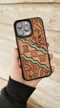 Phone cases are a great way to showcase personal style! Each piece of leather is carefully handcrafted from scratch and adhered to a lightweight phone case. This case design features a floral scrollwork design, decorative border, and up to 4 of your initials or letters of choice. The greenish/turquiose border will default to the color shown in the photos, but you are welcome to request any other color. We can make cases for most popular phone models, so please contact us if you do not see your phone listed. Just a general disclaimer: These cases are only for show & will not protect your phone from damage. They simply cover the exterior of your phone and have no protective qualities aside from very light wear. Finished product may vary slightly from the picture due to its handmade nature. S