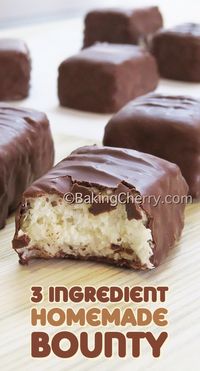 This 3 ingredient homemade Bounty is super easy to make and tastes delicious! Indulge your sweet tooth with this tasty chocolate-covered coconut bars, made with condensed milk, finely shredded coconut and semi-sweet chocolate. #recipe #chocolate #coconut #bounty #mounds #coconutbars #homemade #easydessert #dessert #simpledessert #bakingcherry