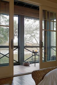 Patio Sliding Doors. Gorgeous Patio Sliding Doors Leading to Screened Porch. Patio Sliding Door Ideas. Patio Sliding Door Photos. #Patio #SlidingDoors Wayne Windham Architect, P.A. Interiors by Gregory Vaughan, Kelley Designs, Inc. Photos by Atlantic Archives, Inc.