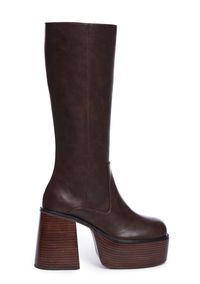 cuz you always go for the classics. These retro knee high boots have a vegan leather construction, chunky platform soles with block heels, and side zip closures.