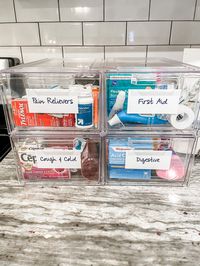 Medicine storage solution- medicine cabinet storage bins, home organization, the home edit, the container store, organized home caninets