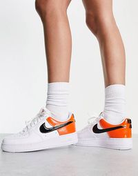 Nike Air Force 1 '07 trainers in white and brilliant orange | ASOS