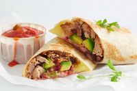 Looking for an easy lunch fix? Try this pulled pork burrito, complete with avocado, beans and salsa.