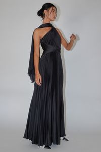 Black, satin, maxi dress Partially lined One shoulder with draping sash decoration Accordion pleat throughout Twisted waist Zipper in side Make a grand entrance in our gorgeous Laxmi maxi dress. We are in love with its stunning accordion pleat, satin fabric and one shoulder style. It's perfect for homecoming or a special event. Team it with a statement purse and chandelier earrings for an unforgettable look. MODEL INFO Model is wearing size S Height: 5'7" Bust: 32.0" Waist: 24.0" Hips: 36.0" CAR