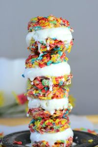 Fruity Pebbles Ice Cream Sandwiches -These are simply adorable. Kind of tastes like a fruity ice cream cone stuffed with yummy vanilla ice cream! Sweet indulgences for summer!