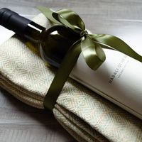 Created by one of our clever staff members a few years ago, this olive oil/hand towel gift set is one of our most popular go-to gifts at the shop. It features a bottle of our organic, fair-trade Palestinian olive oil and a set of two Turkish cotton hand towels in diamond weave. It makes a wonderful hostess, holiday or birthday gift. Choose from any of our hand towels and either the Nabali or Rumi olive varieties. We have the perfect box to wrap it in to make it convenient for you.