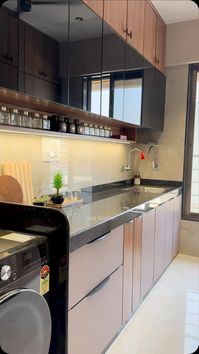 From classy dishes in classy kitchens, even though the dishes don’t look at kitchen designs, YOU DO! And a kitchen like this will put you in the perfect mood to cook for friends, family & you!✨🫶🏻 [Tiarra Interiors, Interior Design, Kitchen Design, Luxury Kitchens, Interior Designers of Borivali, Mumbai] #tiarrainteriors #interiordesign #interiordesignersofmumbai #luxuryinteriors #kitchenorganizationideas #kıtchenideas #kitcheninterior #kitcheninspirations #trendingnow #interiordesignideas #...