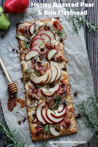 Honey Roasted Pear and Brie Flatbread - Give it Some Thyme – an easy flatbread recipe showcasing sweet pears, creamy brie cheese, salty prosciutto, caramelized walnuts and fresh rosemary! #flatbread #flatbreadrecipes #flatbreadpizza #easyflatbread #pearflatbread #pearflatbreadrecipes #pearflatbreadpizza #pearflatbreadprosciuttopizza #pearandbrie#pearandbrieappetizer #pearandbrieflatbread #pearandbrierecipe #appetizers #healthyappetizers #giveitsomethyme