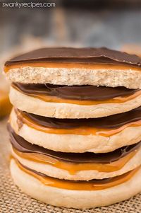 The perfect Twix cookies recipe starts with an unbelievably decadent Shortbread cookies topped with a layer of smooth caramel and a generous layer of gourmet milk chocolate topping.  Get ready for the ultimate fun dessert, these twix cookies are incredibly easy to make!