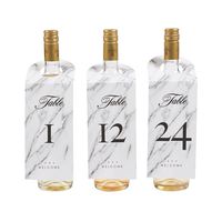 Make it easy for guests to find their seats while complementing your wedding decorations! Printed on a marble background, these chic table numbers add classic style to wedding reception tables. To display each one, simply place it around the top of a wine bottle. Includes numbers 1 - 25, single-sided. Paper. (25 pcs. per unit) 3 3/4" x 11" © OTC