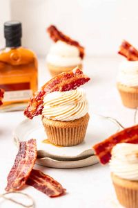 These maple bacon cupcakes are full of flavor from real maple syrup and then topped with bourbon brown butter frosting and candied bacon for the perfect sweet and salty treat!