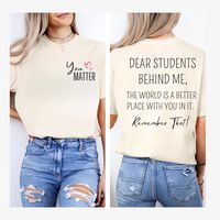 You Matter Dear Students Behind Me Teacher Shirt - the perfect back-to-school tee for educators! Show your support with this thoughtful school shirt, great for teacher appreciation in kindergarten, elementary, and beyond. Ideal gift for any dedicated teacher. What could be more delightful than a soft, lightweight, high-quality cotton t-shirt in your collection? This cozy, contoured tee is crafted from 100% cotton, offering a semi-fitted silhouette that remains a long-lasting wardrobe essential a