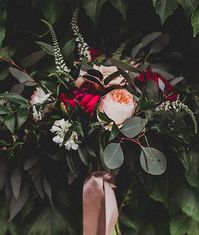 romantic pink and burgundy moody wedding bouquet