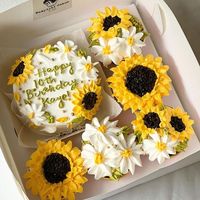 Wampipti Cakes Dgte by D&B 🇵🇭 on Instagram: "Sunflower and Daisies 🌻🤍 #bentocake #bentocakesph #floralcake #floralcupcakes #cakedesign #minimalistcakesph #minicakesph #cakesbydnb"