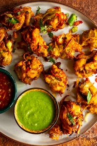 This Onion Bhaji Recipe (Indian Restaurant Style) is pure magic! Learn how to make Onion Bhaji super light & crispy. Easy, delicious recipe.