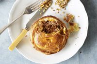 This Aussie meat pie is filled with slow cooked lamb shoulder, a mint sauce and is topped with a golden, flaky puff pastry lid.