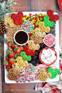 Start your day the Disney way with an awesome Mickey Waffle Charcuterie Board! It's loaded with festive Mickey Mouse-shaped waffles and lots of delicious toppings. It is so easy to put together - the whole family will love it for Christmas breakfast or brunch!