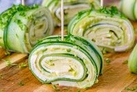 Turkey + Cheese Cucumber Rolls - ripe avocado, fresh garlic clove, fresh lime juice, sea salt & black pepper, cucumbers, turkey/ham slices, thin cheese slices, fresh parsley